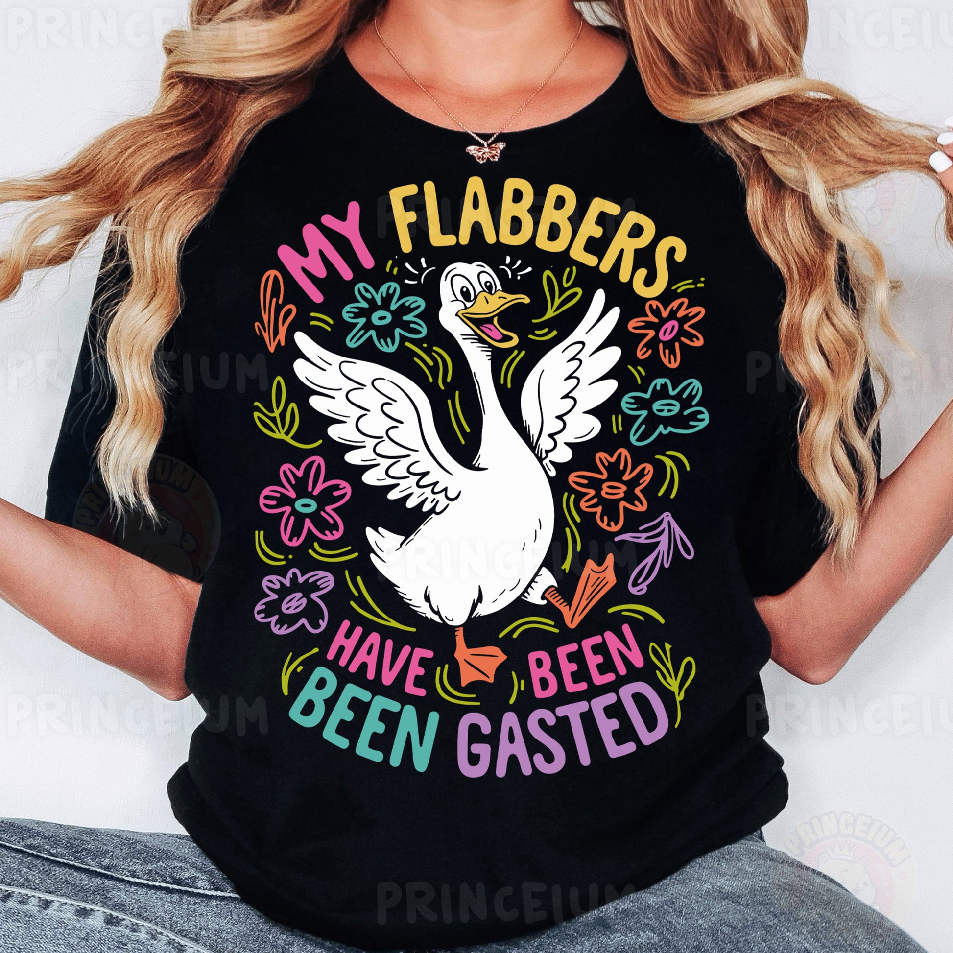 a woman wearing a black tshirt with a white swan on it