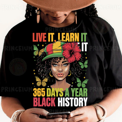 a woman wearing a black t - shirt with a black history design on it