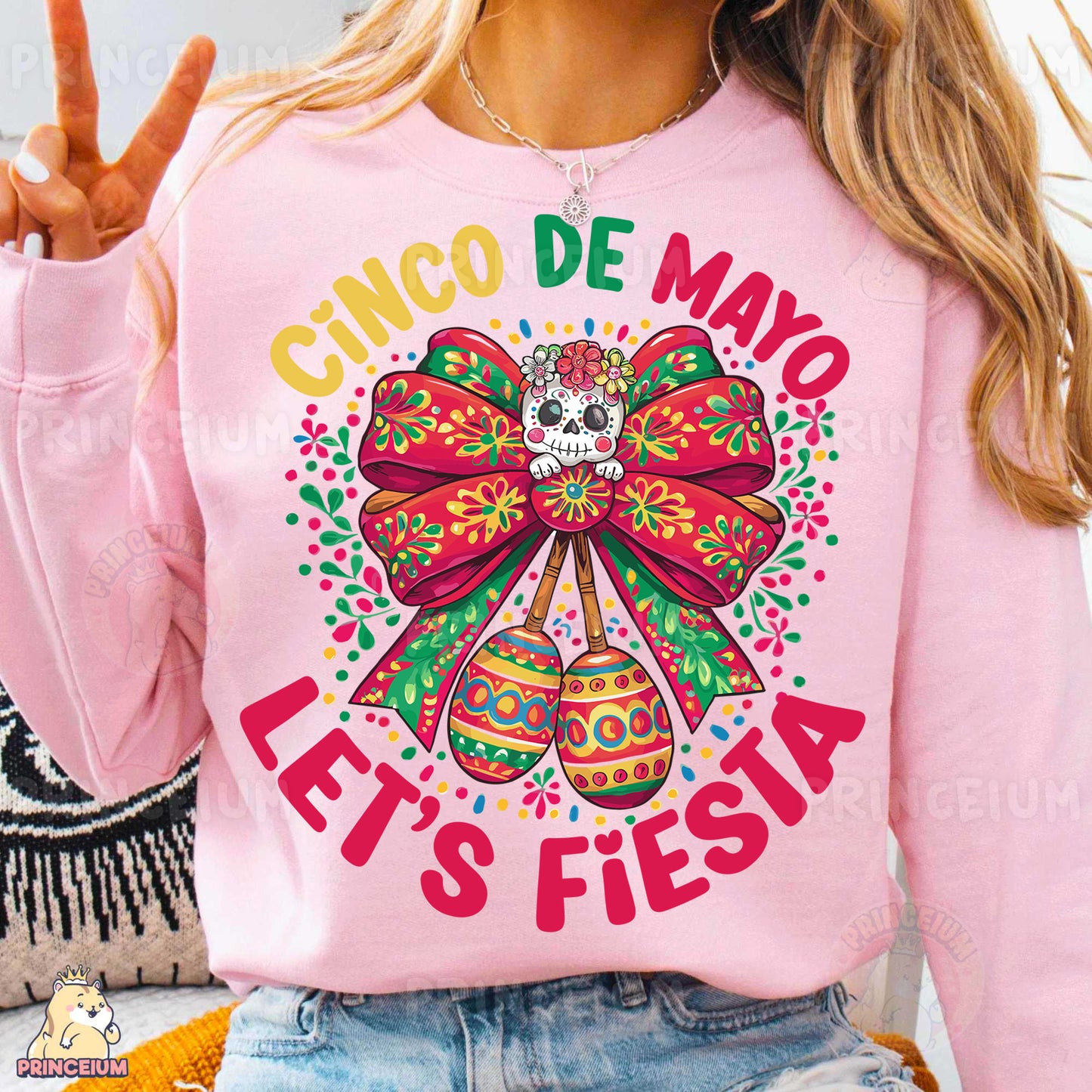 a woman wearing a pink shirt with a bow on it