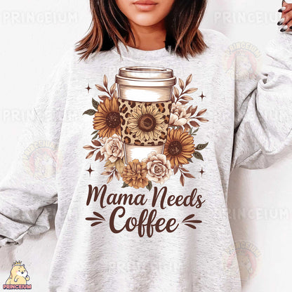 a woman wearing a sweatshirt that says mama needs coffee