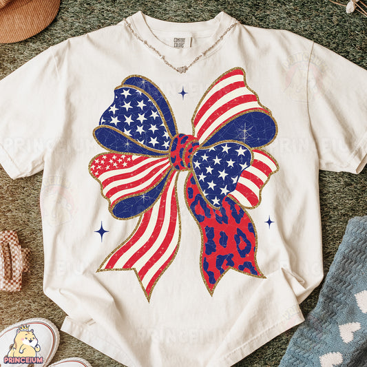 a white shirt with a red, white and blue bow on it