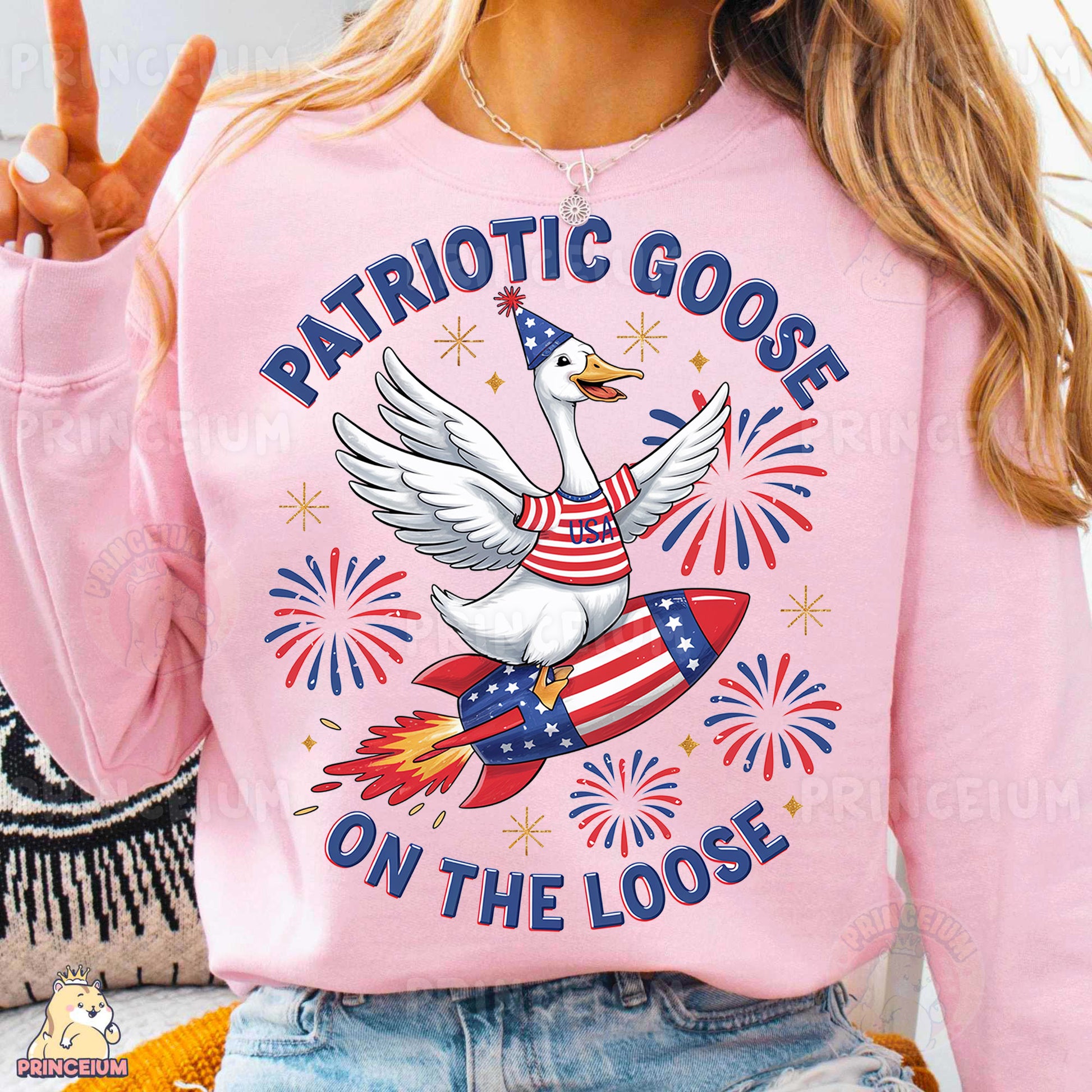 a woman wearing a patriotic goose on the loose shirt