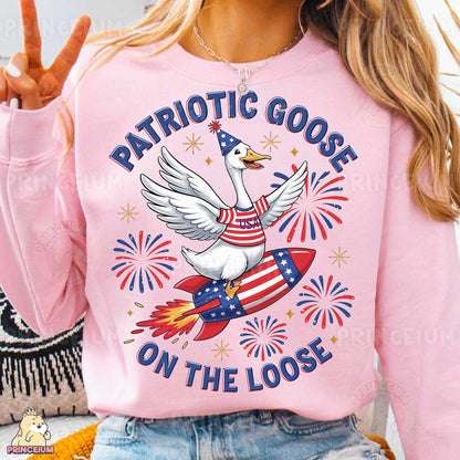 a woman wearing a patriotic goose on the loose shirt