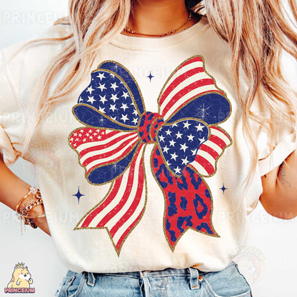 a woman wearing a patriotic bow t - shirt