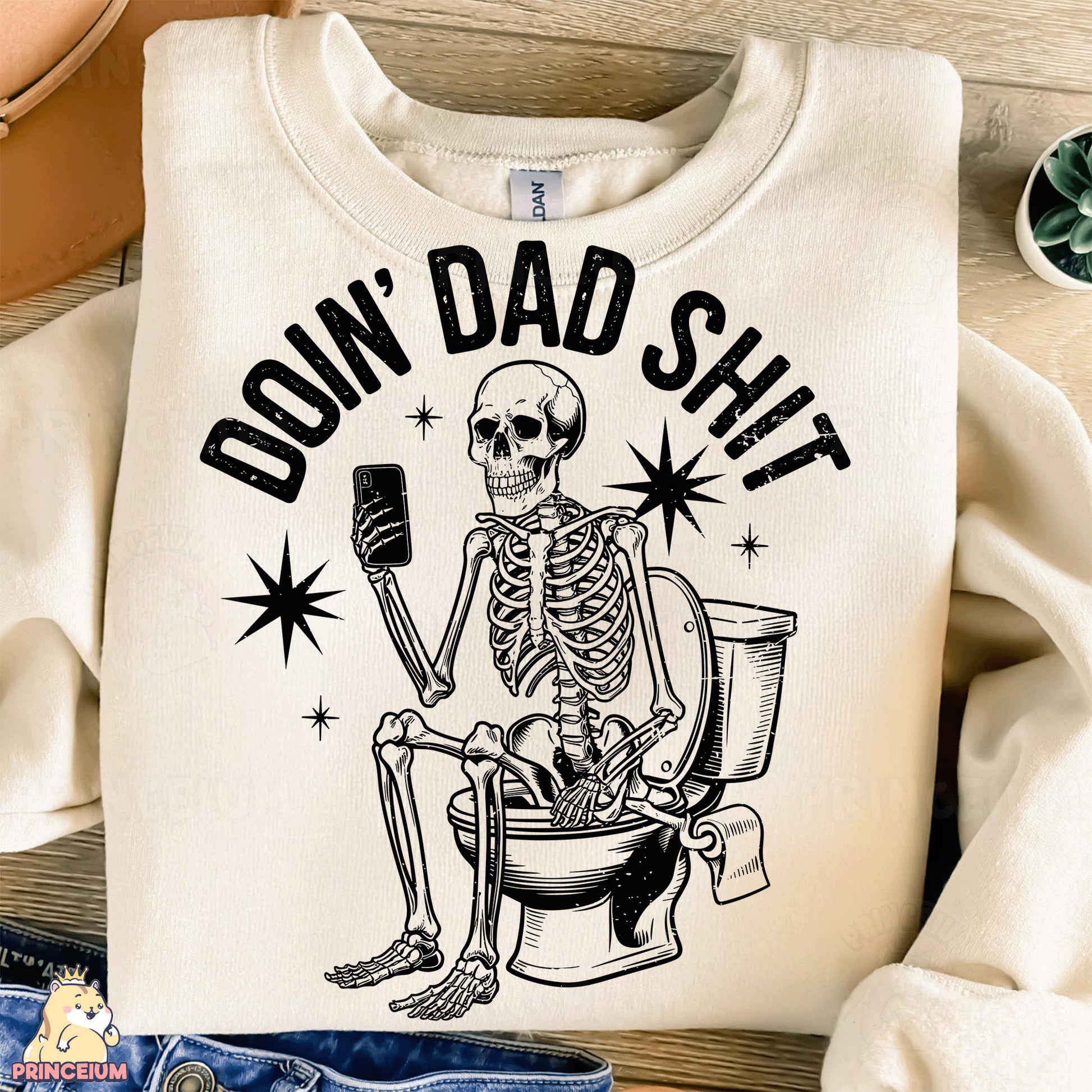 a white shirt with a skeleton sitting on a toilet