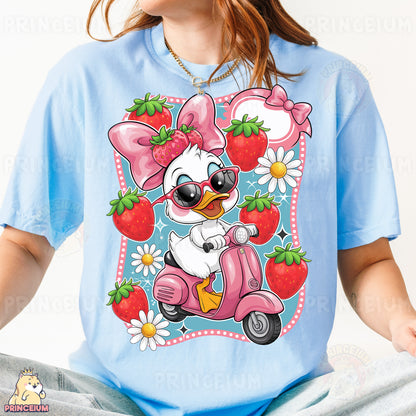 a girl wearing a blue t - shirt with a cartoon character on it