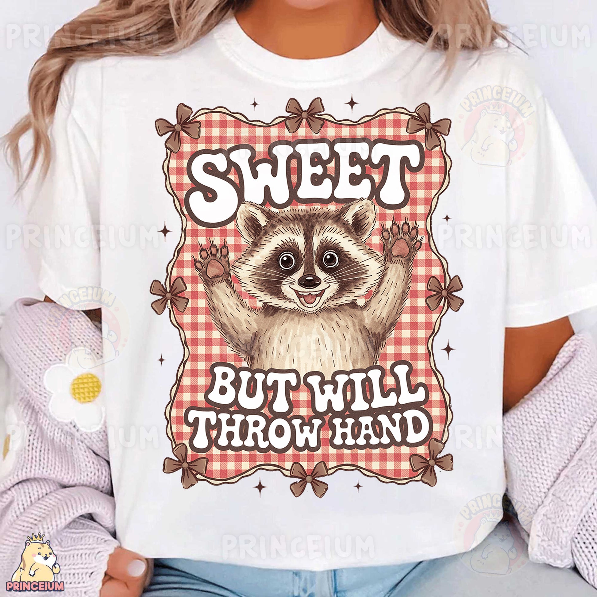 a woman wearing a white shirt with a raccoon on it