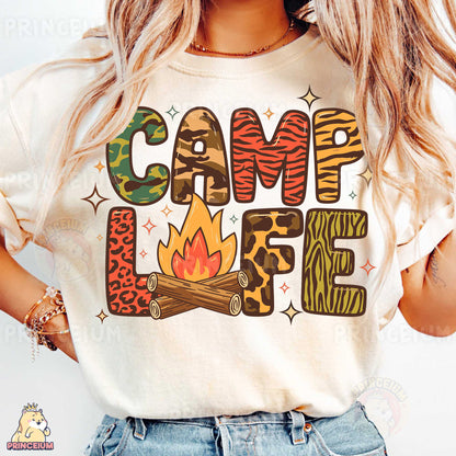 a woman wearing a t - shirt that says camp life