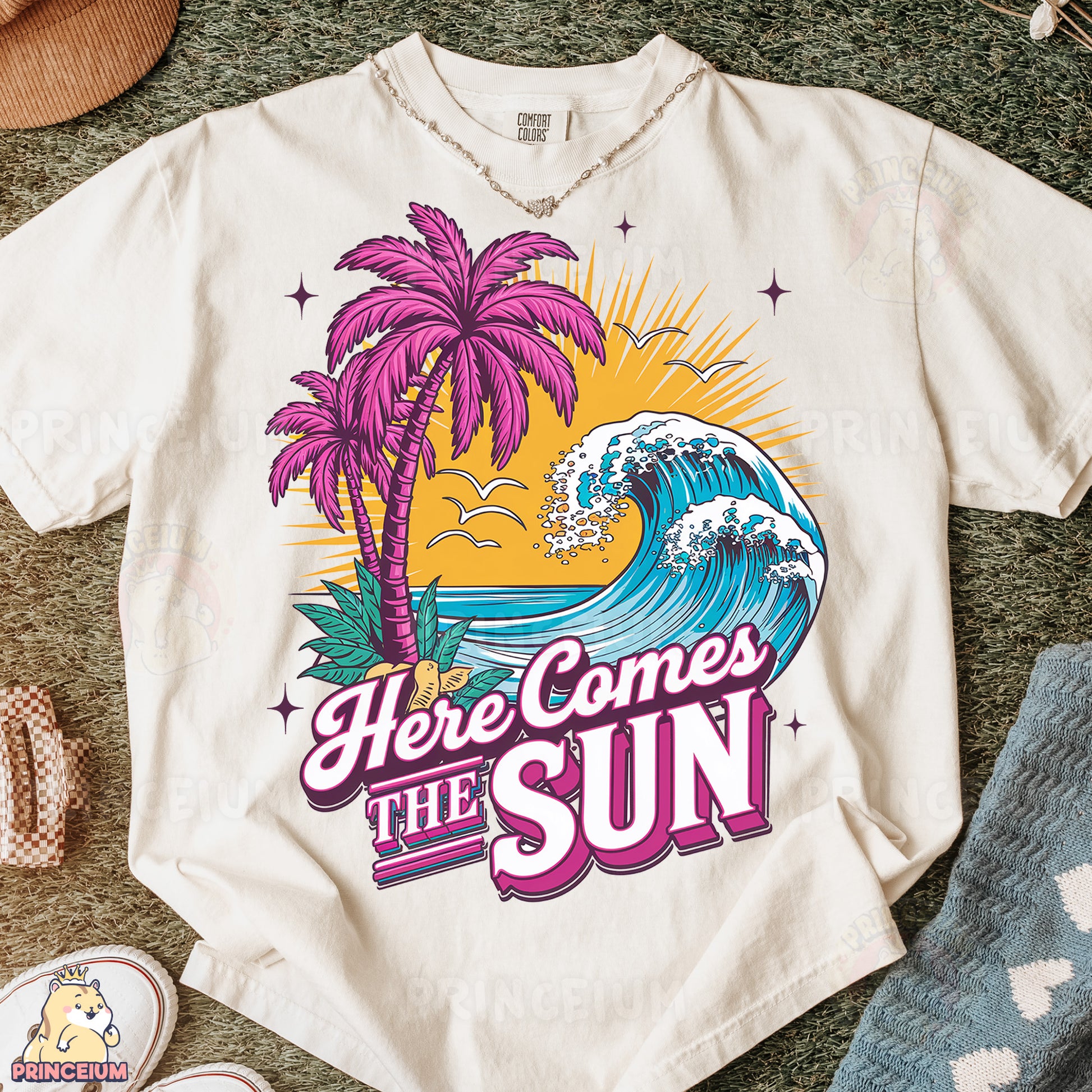 a t - shirt that says here comes the sun with a picture of a palm