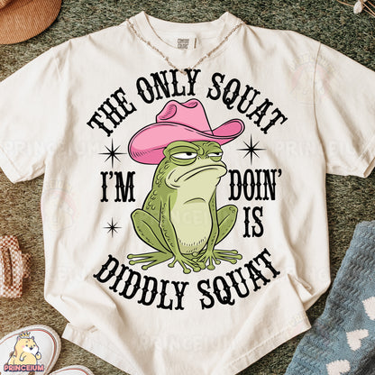 a t - shirt with a frog wearing a pink cowboy hat