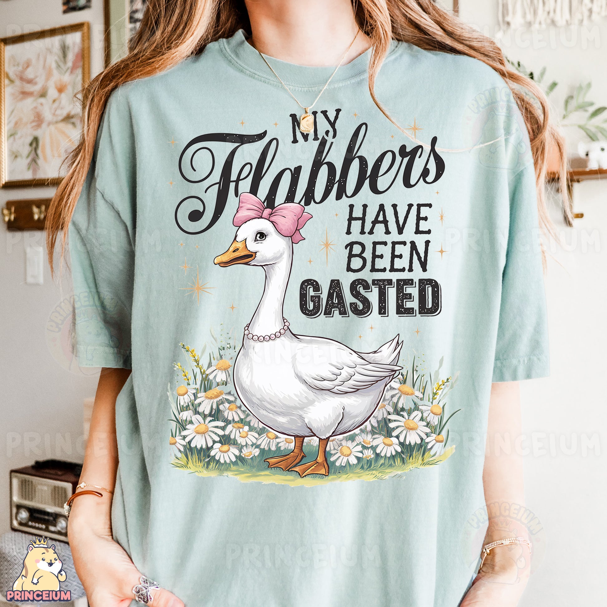 a woman wearing a t - shirt with a picture of a duck on it