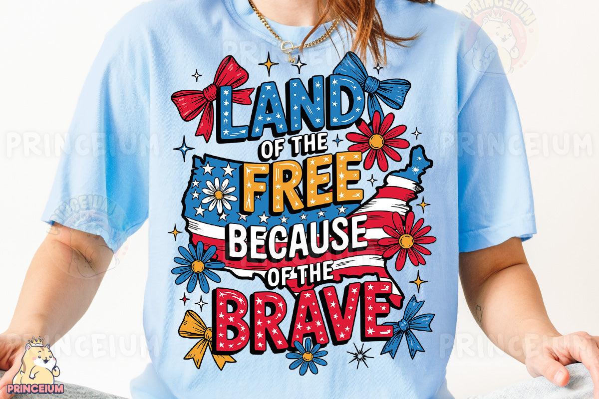 a woman wearing a t - shirt that says land of the free because of the