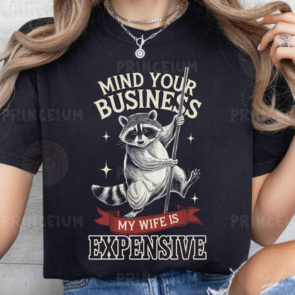 a woman wearing a black shirt with a raccoon on it