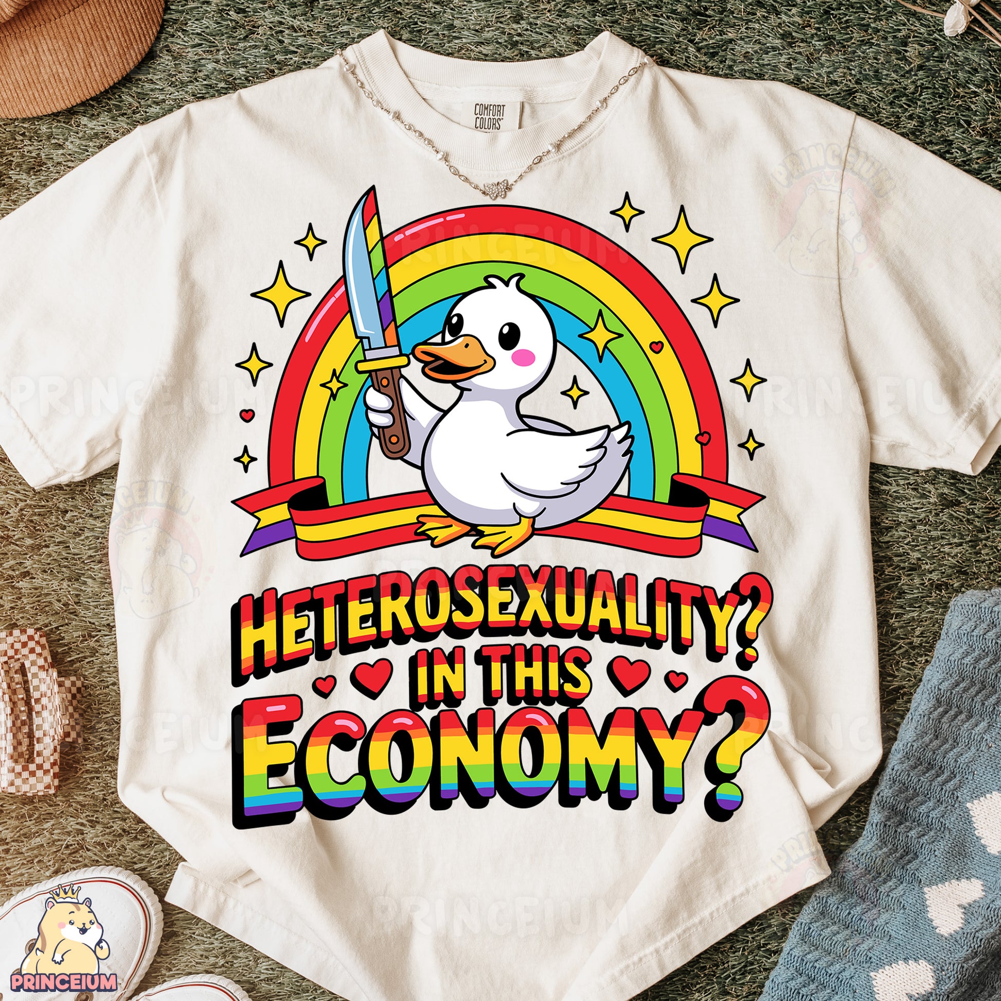 a t - shirt with a duck holding a knife in it