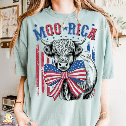 a woman wearing a t - shirt with a cow wearing a bow tie