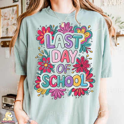 a woman wearing a t - shirt that says last day of school