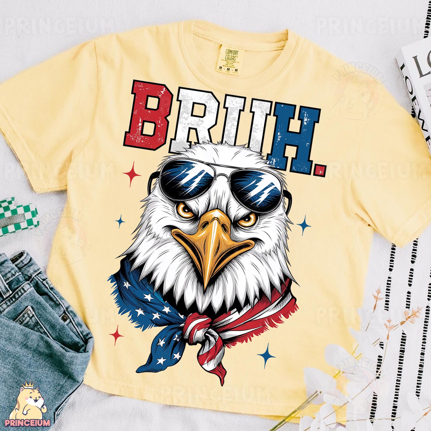 a yellow shirt with an eagle wearing sunglasses