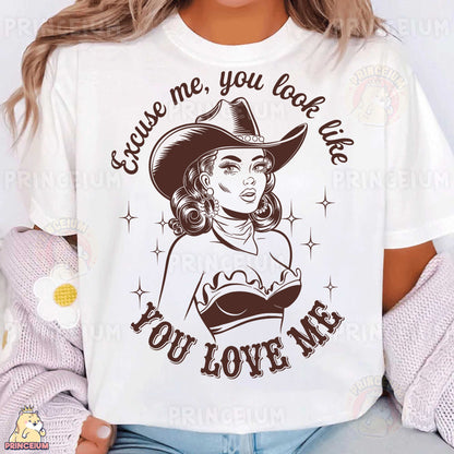 a woman wearing a t - shirt that says, you love me