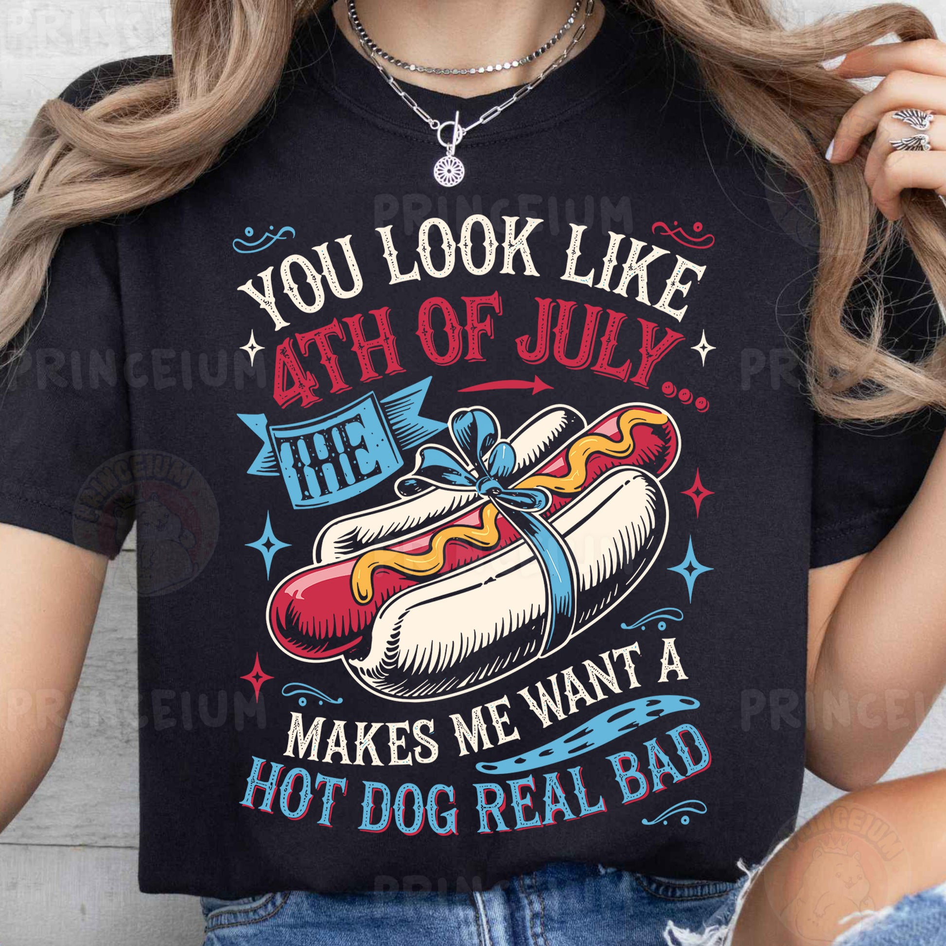 a woman wearing a black shirt with a hot dog on it