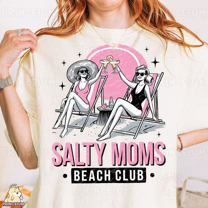a woman wearing a t - shirt that says salty moms beach club