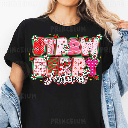 a woman wearing a black t - shirt that says straw berry festival
