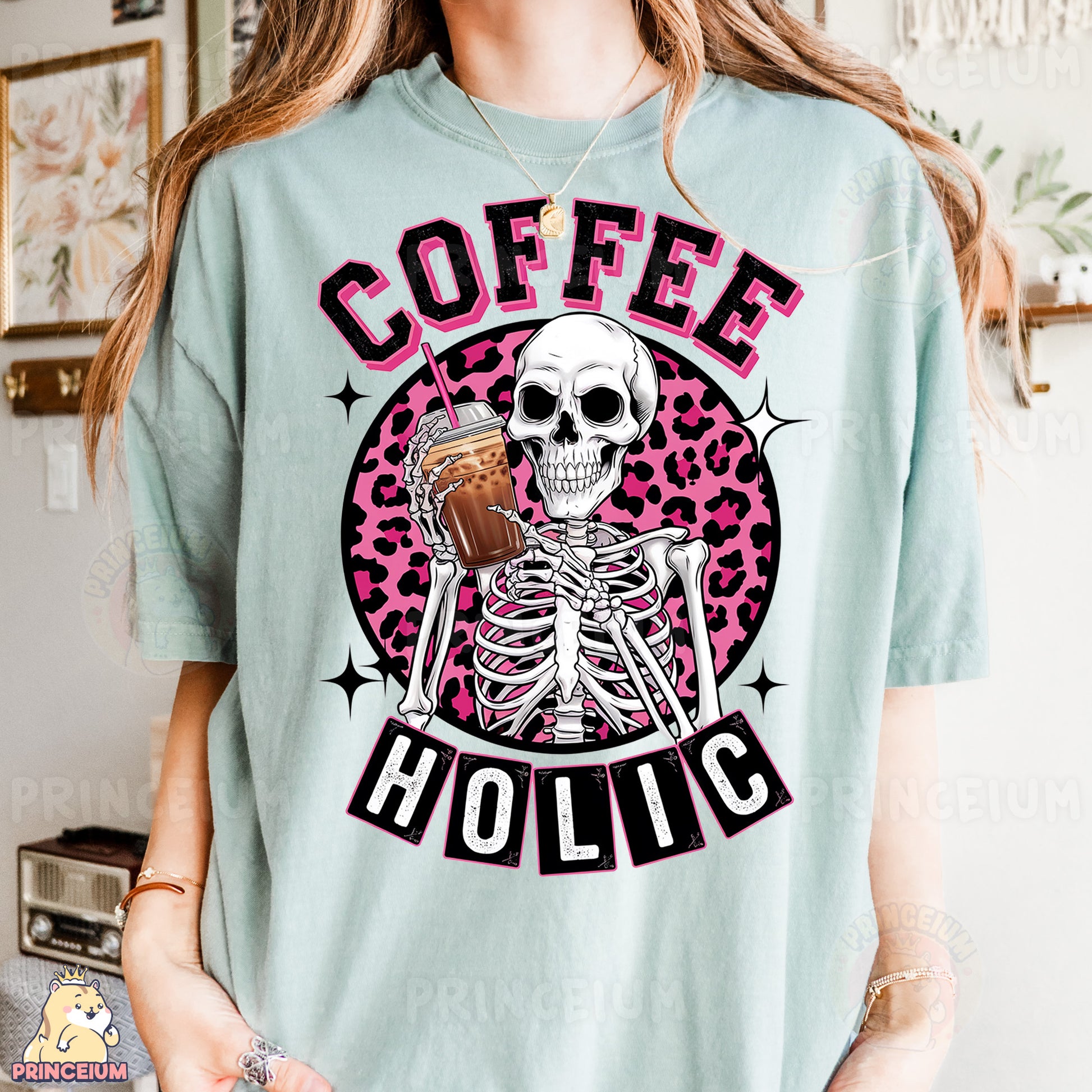 a woman wearing a t - shirt with a skeleton holding a cup of coffee