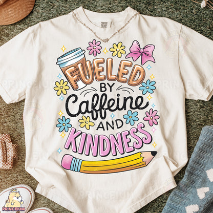 a t - shirt that says fueled by caffeine and kindness