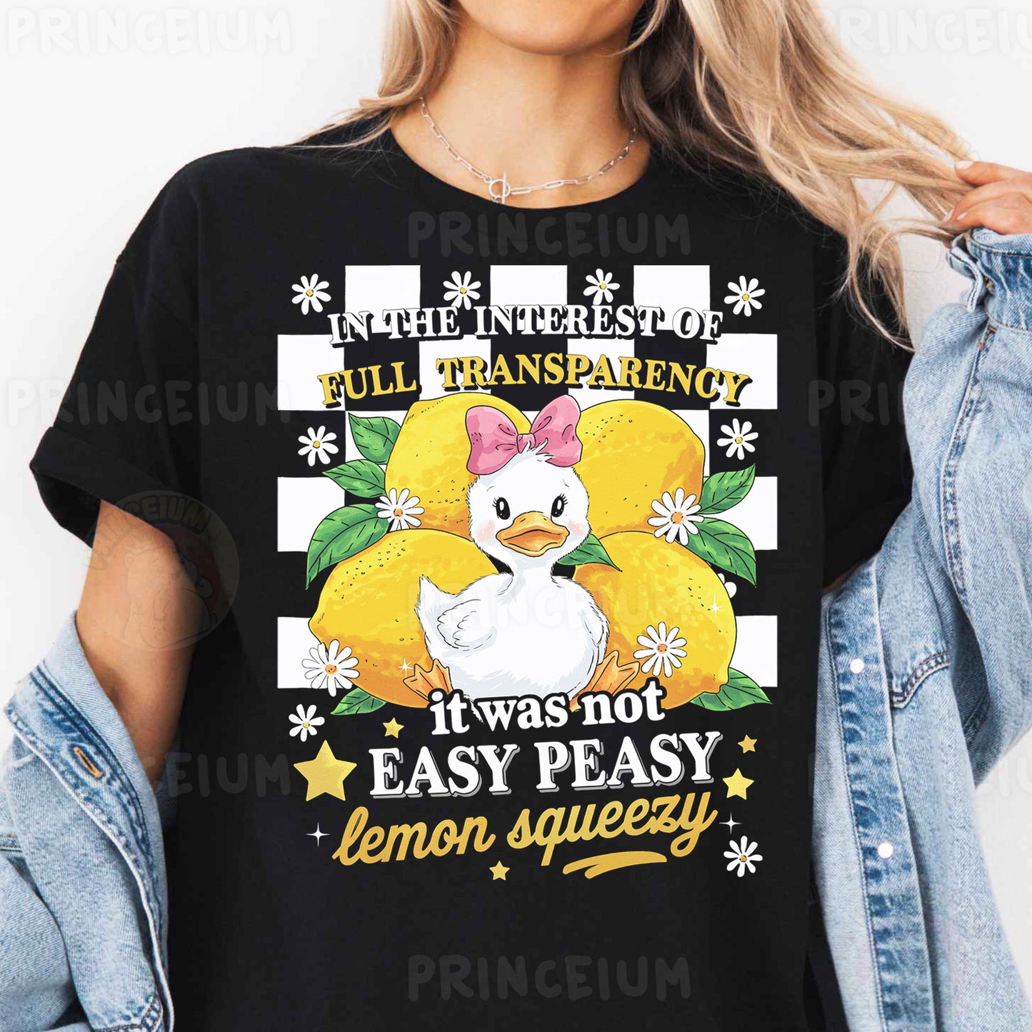 a woman wearing a black t - shirt with a chicken on it