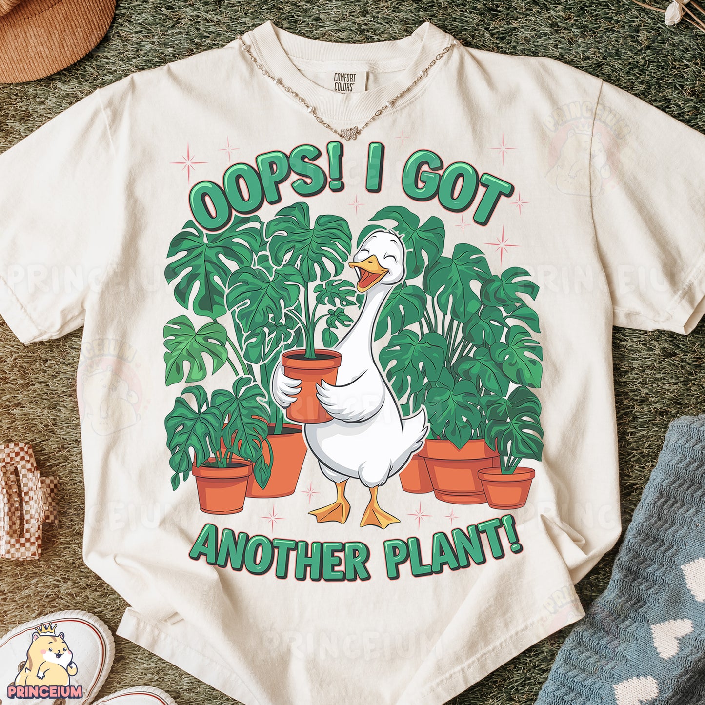 a t - shirt with a goose holding a potted plant