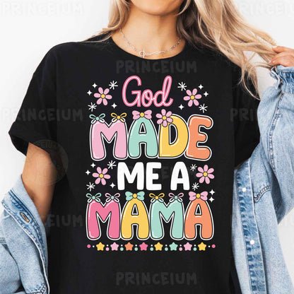 a woman wearing a black shirt that says god made me a mama