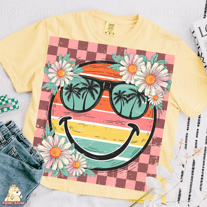 a t - shirt with a smiley face wearing sunglasses