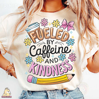 a woman wearing a t - shirt that says fueled by caffeine and kind