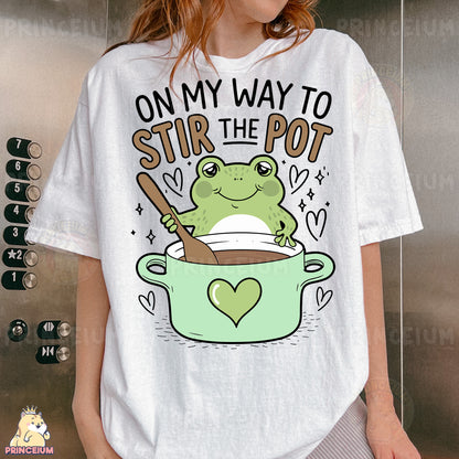 a woman wearing a t - shirt that says, on my way to stir the