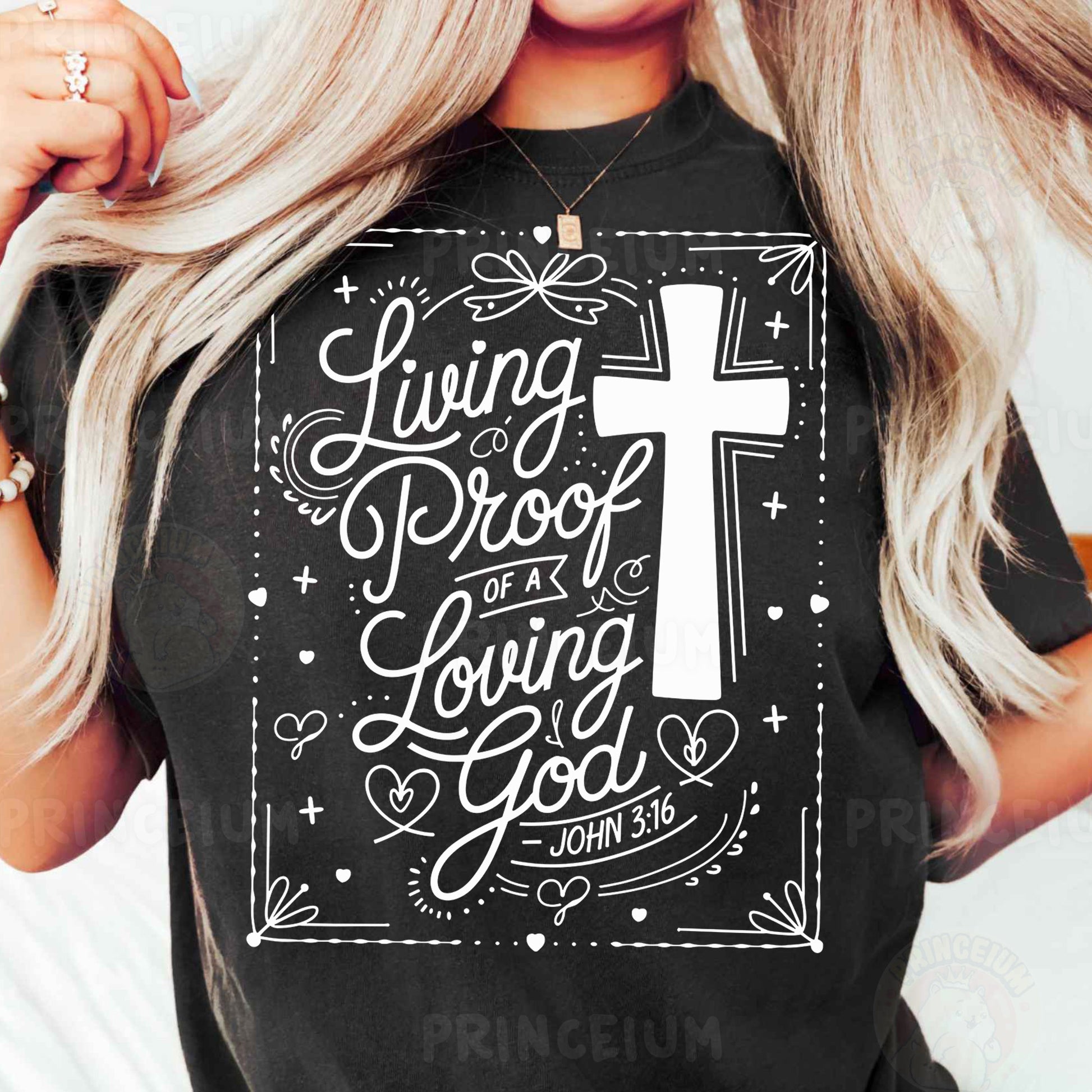 a woman wearing a black t - shirt with a cross on it