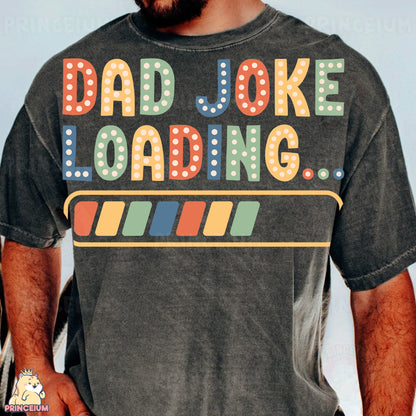 a man wearing a t - shirt that says dad joke loading
