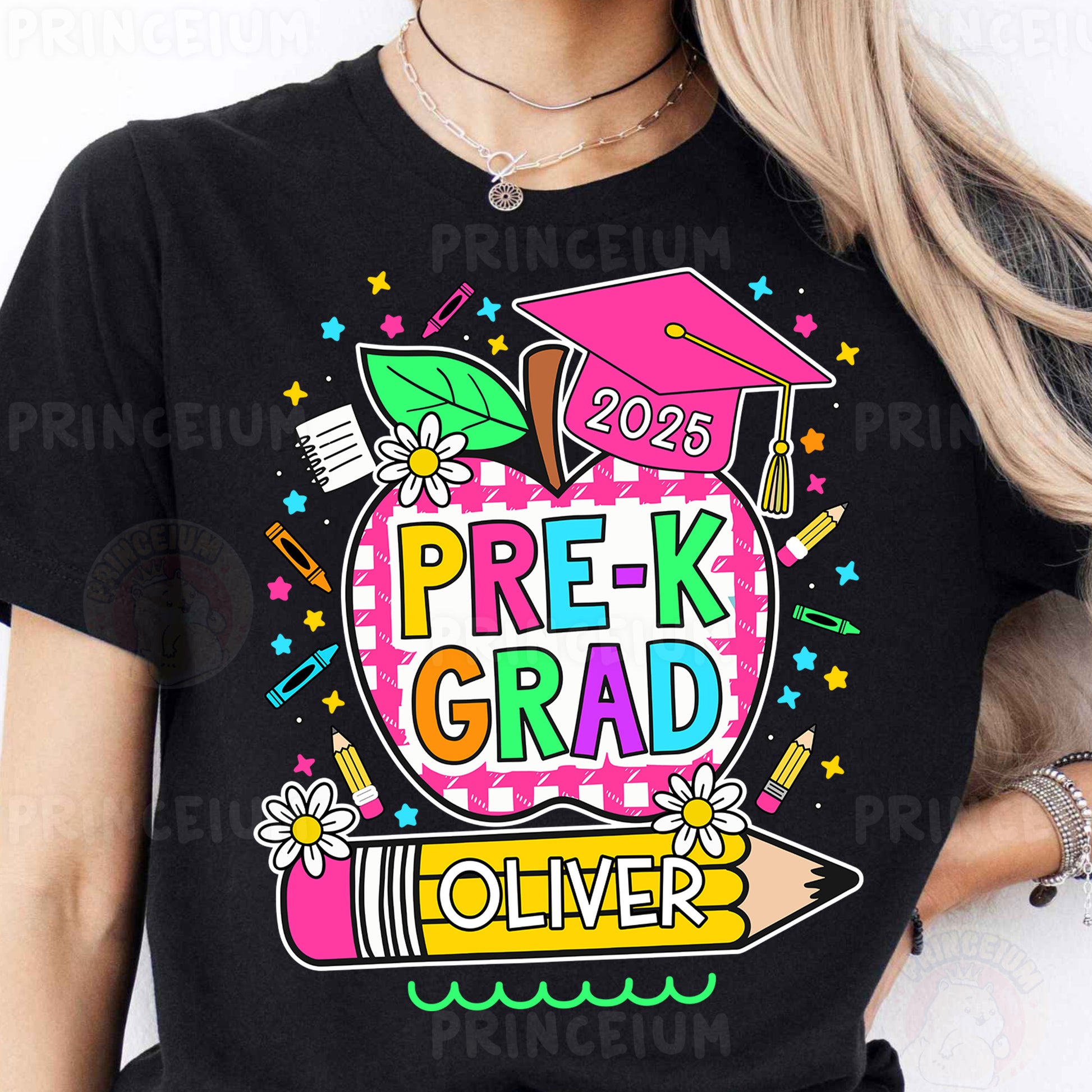 a woman wearing a black t - shirt with the words prek grad on