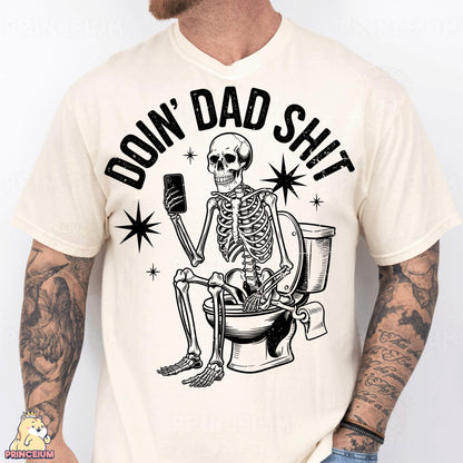 a man wearing a white shirt with a skeleton sitting on a toilet