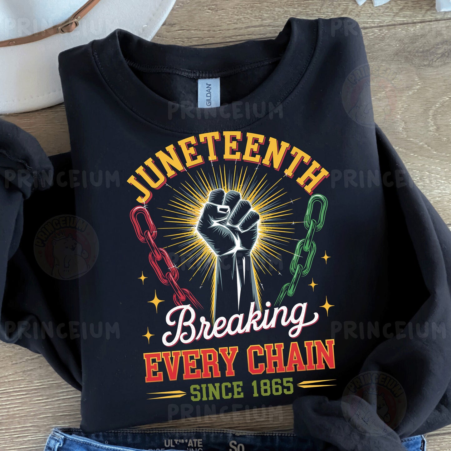 a black t - shirt with the words juneteeth breaking every chain since 1876