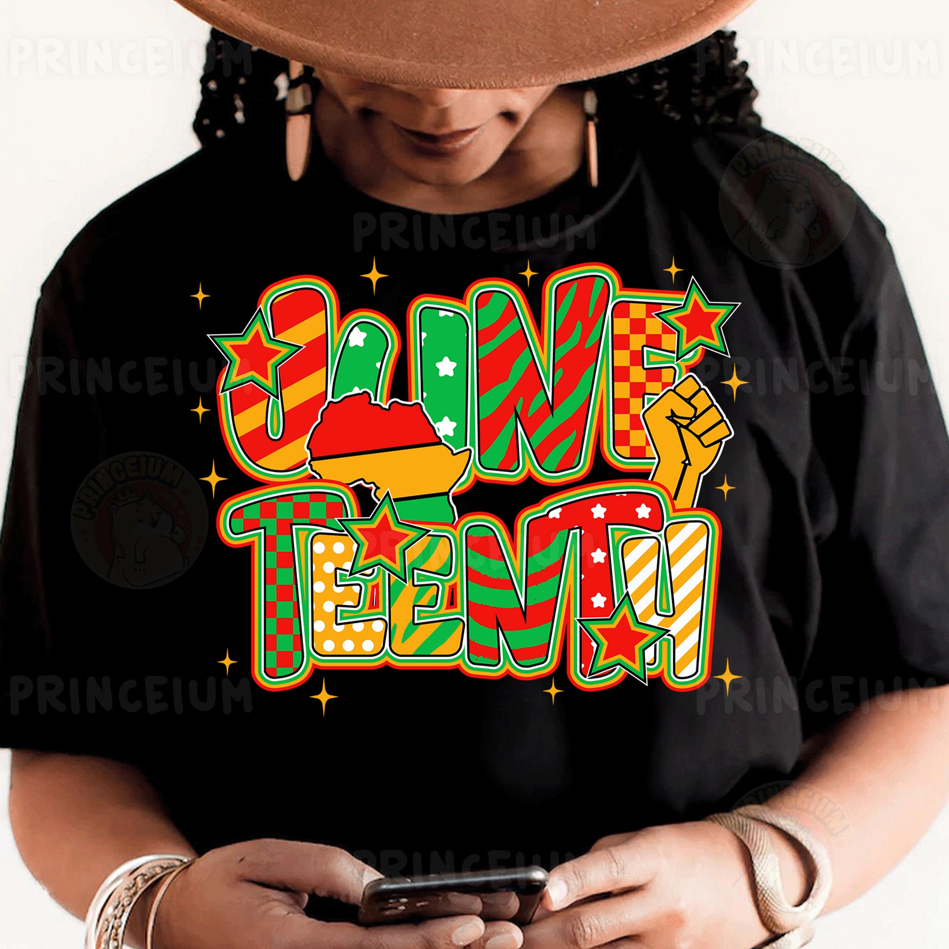 a person wearing a black shirt and a hat holding a cell phone