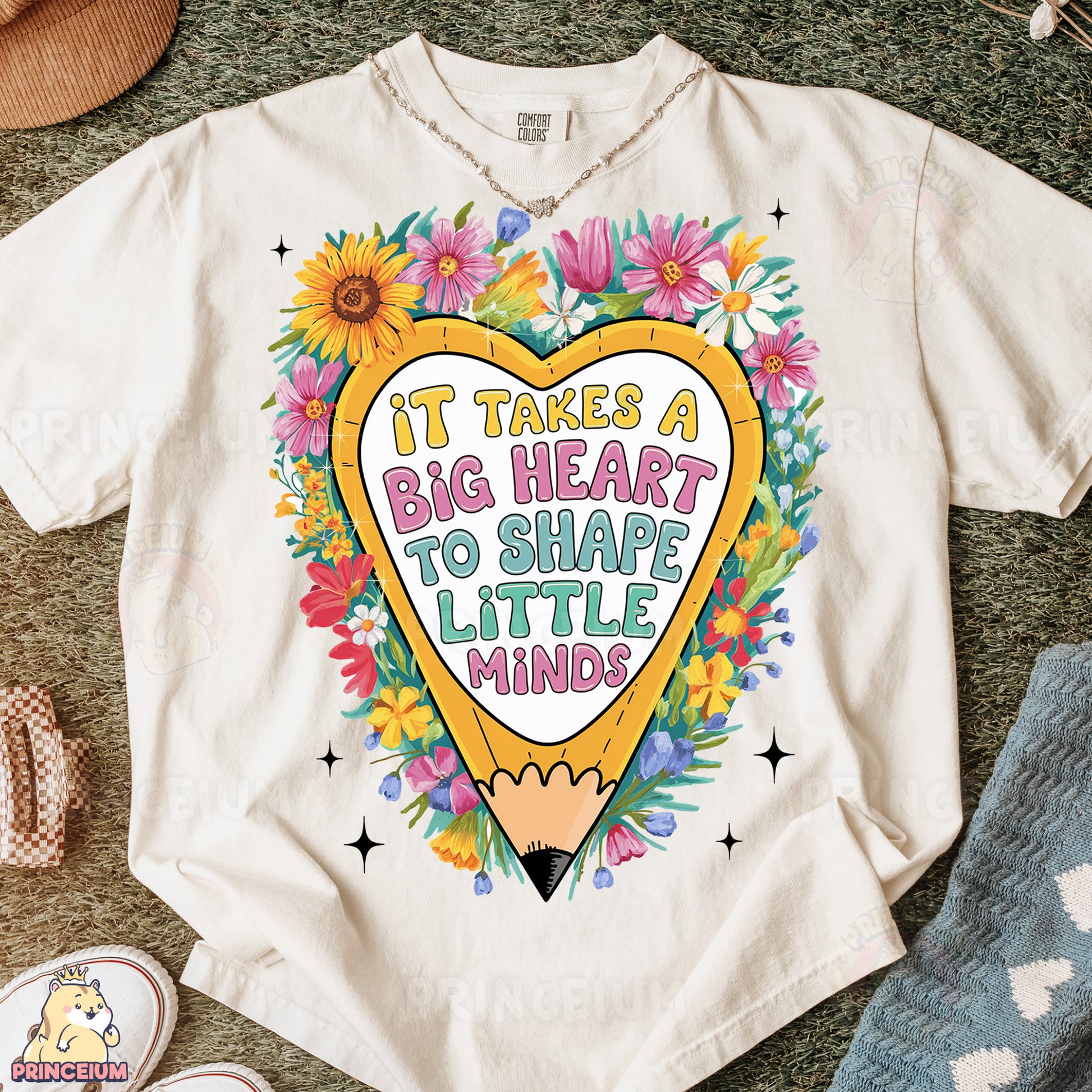 a t - shirt that says it takes a big heart to shape little minds