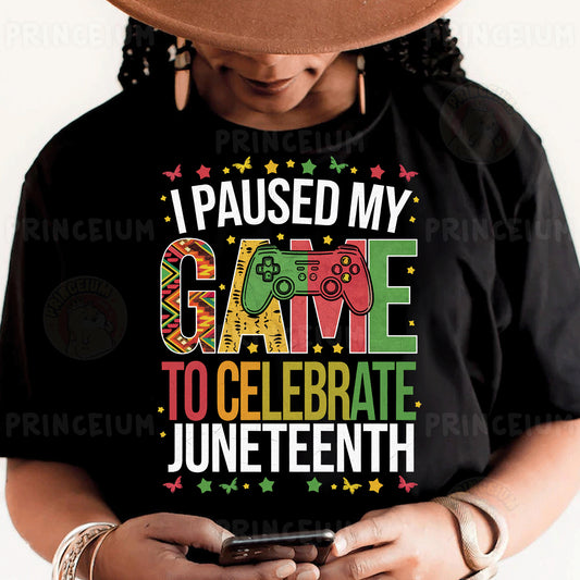 a person wearing a black shirt and a hat holding a cell phone