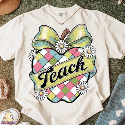 a t - shirt with the word teach on it
