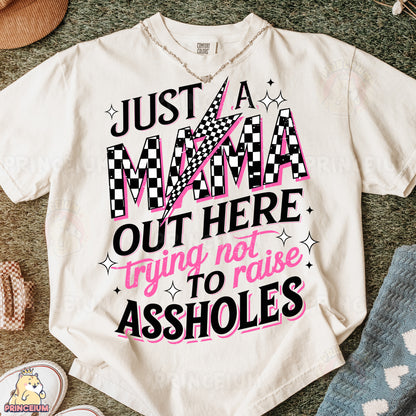 a t - shirt that says just a mama out here trying not to rise as