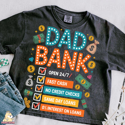 a t - shirt that says dad bank next to a pair of jeans