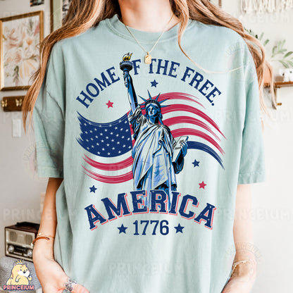 a woman wearing a t - shirt with the statue of liberty on it