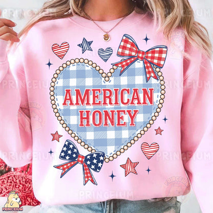 a woman wearing a pink american honey sweatshirt