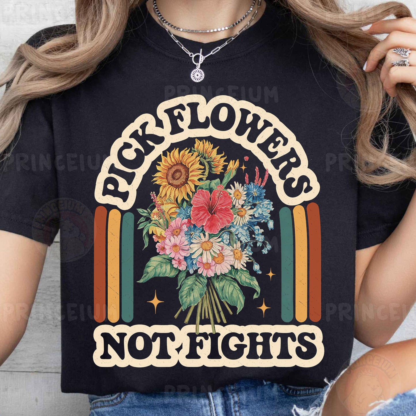 a woman wearing a black t - shirt that says rock flowers not fights