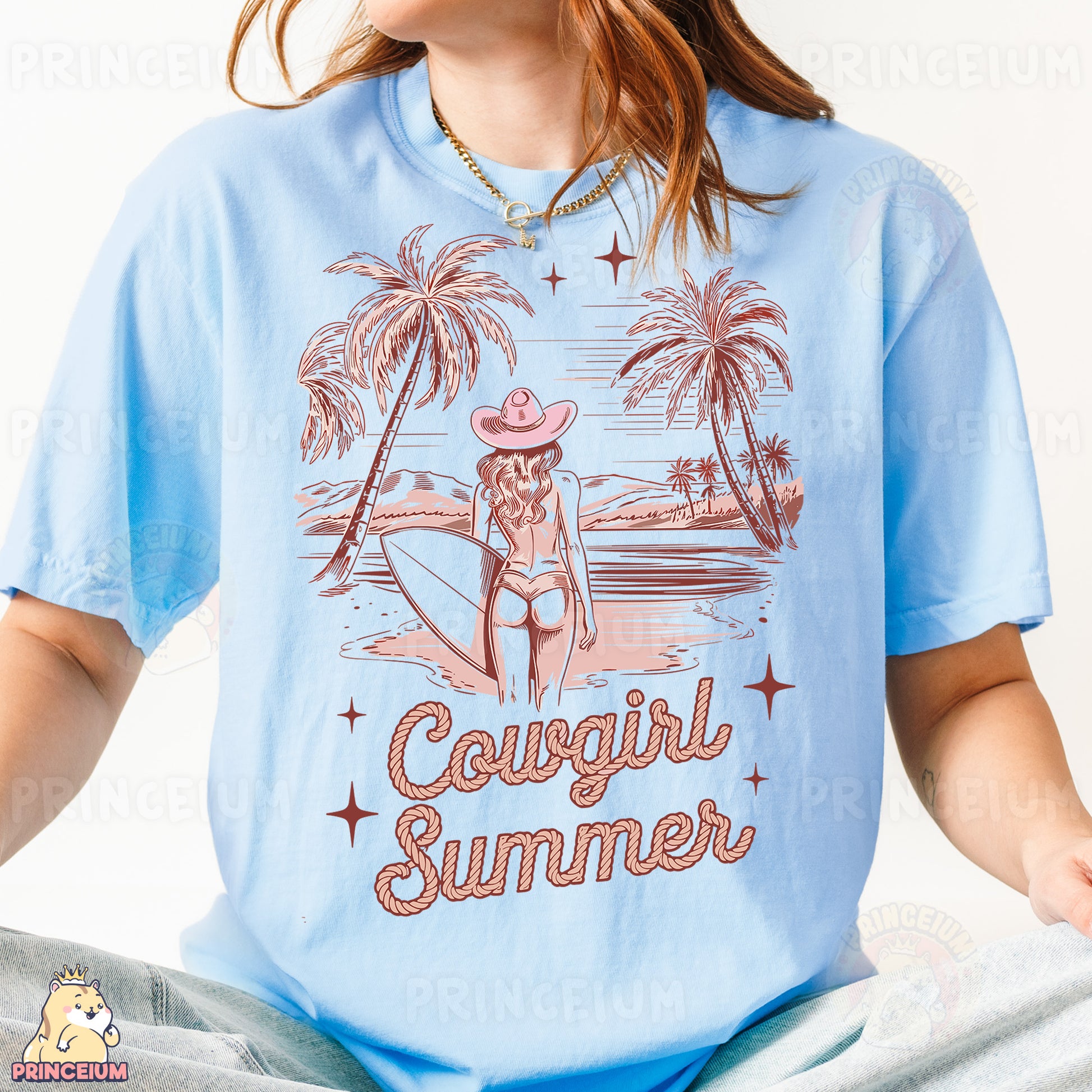 a woman wearing a blue shirt with a picture of a woman in a cowboy hat