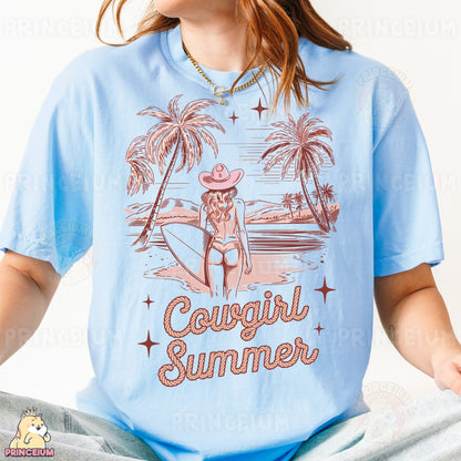 a woman wearing a blue shirt with a picture of a woman in a cowboy hat