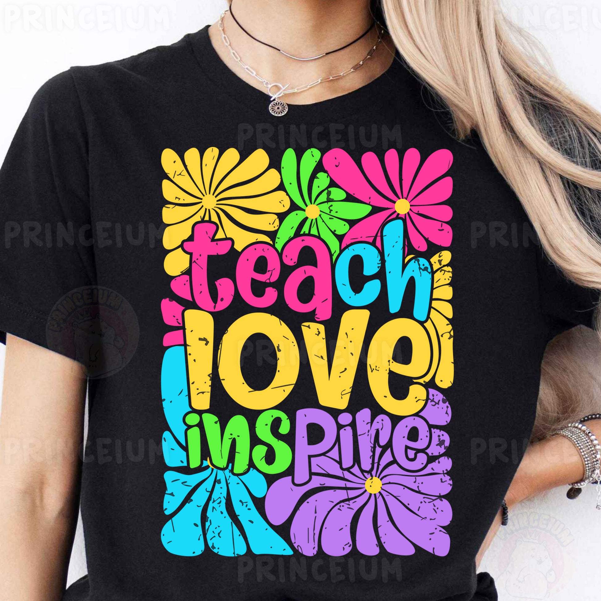 a woman wearing a t - shirt that says teach love inspire
